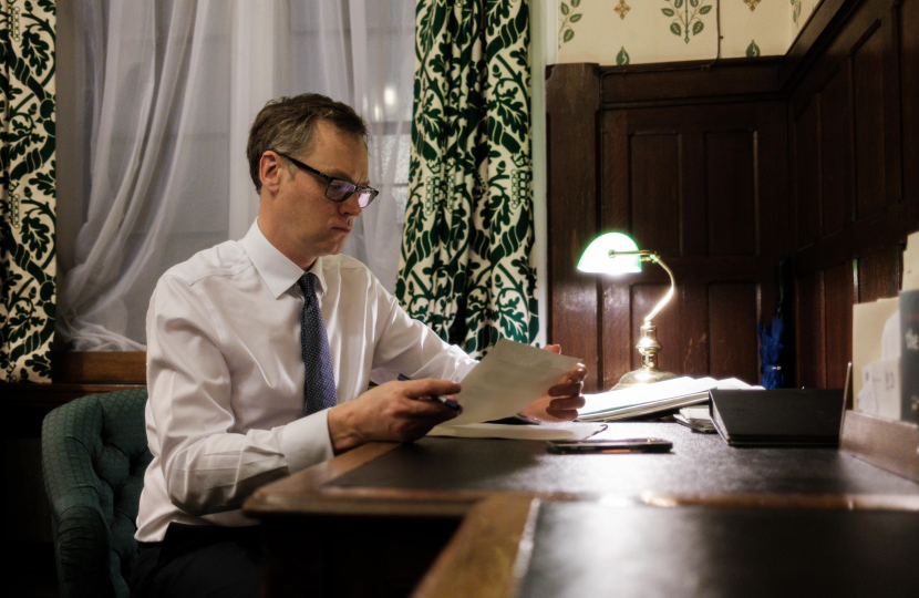 Michael working in Parliament