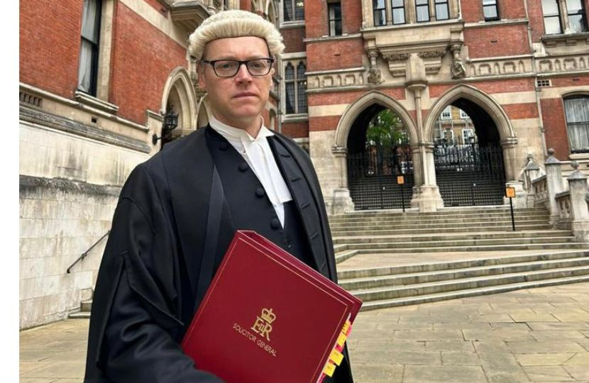 Michael in wig and gown outside court